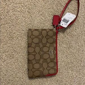 Coach wristlet.